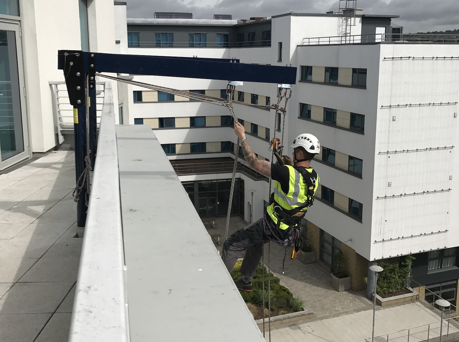 sep uk Abseiler fully supported by davit arm